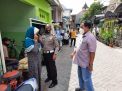 Bagikan Masker Kepada Warga, Polsek Kenjeran Terus Berupaya Memutus Rantai Penyebaran Covid-19