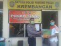 Babinkamtibmas Morokrembangan Berikan Bingkisan Lebaran Untuk Anggota Linmas