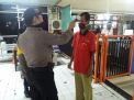 Polsek Pabean Cantikan Lakukan Pemeriksaan Suhu Badan Penumpang Kereta Api