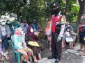 Babinkamtibmas Bulak Amankan Pelaksanaan Pembagian BLT