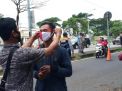 Polsek Kenjeran Gelar Operasi Masker Bareng Satpol PP, Tekan Penyebaran Covid-19