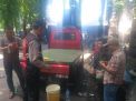 Babinkamtibmas Bongkaran Sampaikan Himbauan Keselamatan Ke Pedagang Ban Bekas