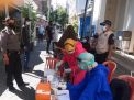 Babinkamtibmas Polsek Pabean Cantikan Lakukan Pengamanan Swab Massal di Jalan Muteran