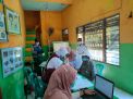 Babinkamtibmas Supriadi Amankan Pelaksanaan Vaksinasi di RW 01 Jalan Sidorame