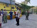 Babinkamtibmas Perak Timur Pam Pengambilan Bantuan Sosial Tunai di Jalan Trenggono