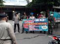 Kapolsek Asemrowo Pimpin Operasi Penertiban Masker di Jalan Asem Raya