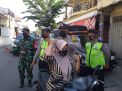 Kapolsek Krembangan Pimpin Operasi Penertiban Masker Gabungan di Jalan Tambak Asri