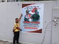 Babinkamtibmas Polsek Krembangan Lakukan Pemasangan Spanduk Anti Golput