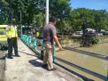 Antisipasi Musibah Banjir, Polsek Pabean Cantikan Pantau Debit Air di Sungai Kalimas