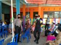 Babinkamtibmas Polsek Kenjeran Amankan Vaksinasi Covid-19 di Balai RW 05 Jalan Pogot