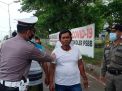 Polsek Kenjeran Gelar Operasi Penertiban Masker Bersama Satpol PP di Akses Suramadu