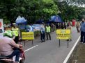 Polsek Kenjeran Bersama Personil Gabungan Gelar Operasi Penertiban Masker di Akses Suramadu