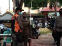 Polsek Kenjeran Gelar Operasi Penertiban Masker di Jalan Nambangan Bersama Satpol PP