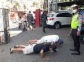 Kanit Lantas Polsek Asemrowo Pimpin Penertiban Masker di Depan Mako