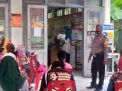 Babinkamtibmas Perak Utara Lakukan Pengamanan Pembagian BLT