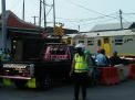 Polsek Asemrowo Atur Lalu Lintas Pagi di Jalan Tambak Mayor