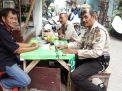 Babinkamtibmas Perak Timur Sampaikan Himbauan Siskamling