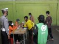 Polsek Asemrowo Kawal Pembagian Bantuan Sosial Tunai