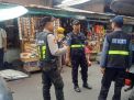 Satsabhara Polres Tanjung Perak Gelar Patroli Bersama di Pasar Ujung
