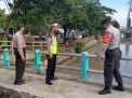 Pantau Debit Air di Sungai Kalimas, Polsek Pabean Cantikan Antisipasi Banjir