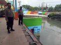 Polsek Asemrowo Pantau Debit Air Waspada Banjir di Rumah Pompa Balong 2
