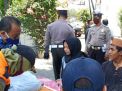 Kapolsek Kenjeran Pimpin Operasi Penertiban Masker di Depan Kantor Kelurahan Bulak