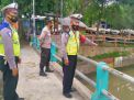 Polsek Pabean Cantikan Lakukan Pemantauan Debit Air di Sungai Kalimas, Waspada Potensi Banjir