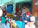Personil Polsek Semampir Kawal Vaksinasi Covid-19 di Balai RW 03 Kelurahan Sidotopo