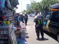 Satsabhara Polres Tanjung Perak Gelar Patroli Bersama Pelindo di Pasar Ujung