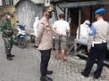 Kapolsek Asemrowo Pimpin Razia Masker di Kampung Tambak Mayor Baru