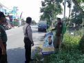 Babinkamtibmas Tambak Wedi Kawal Penertiban APK di Sepanjang Kali Tebu