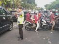 Polsek Pabean Cantikan Lakukan Pengaturan Lalu Lintas Sore, Bantu Kepulangan Pekerja