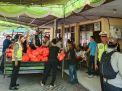Polsek Pabean Cantikan Lakukan Pengamanan Pembagian Sembako Untuk Warga Miskin