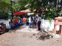 Polsek Kenjeran Kawal Pembagian Bantuan Uang Tunai di Kantor Pos