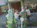 Kapolsek Kenjeran Pimpin Penertiban & Pembagian Masker di Pasar Wage