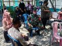 Babinkamtibmas Polsek Kenjeran PAM Swab Tes di Puskesmas Takal Kedinding