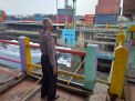 Pantau Debit Air, Polsek Asemrowo Waspada Potensi Musibah Banjir