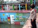 Polsek Kenjeran Pantau Debit Air, Waspada Potensi Banjir