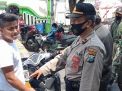 Polsek Semampir Gelar Operasi Penertiban Masker di Pintu Masuk Wisata Religi Ampel