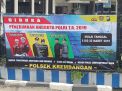 Polsek Krembangan Lakukan Pemasangan Banner Pembukan Pendaftaran Anggota Polri