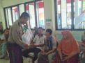 Polsek Asemrowo Sosialisasi Pendaftaran Polri ke Pengunjung Puskesmas
