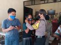 Polsek Kenjeran Bersama Instansi Samping Lakukan Operasi Masker di Warkop & Pertokoan