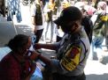 Babinkamtibmas Perak Utara Bersama Instansi Samping Lakukan Penertiban & Pembagian Masker di Pemukiman