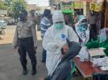 Kapolsek Semampir Pimpin Operasi Swab Hunter di Jalan Wonokusumo