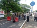 Polsek Kenjeran Gelar Operasi Penertiban Masker di Akses Suramadu