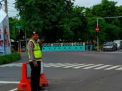 Polsek Kenjeran Atur Lalu Lintas Sore Bantu Kepulangan Karyawan