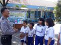 Babinkamtibmas Perak Barat Laksanakan Rabu Narsis di SD Santo Mikael