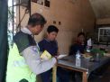 Babinkamtibmas Perak Timur Terus Sosialisasikan SPKT Door To Door