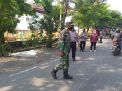 Polsek Krembangan Gelar Operasi Penertiban Masker di Klenteng Mbah Ratu