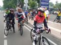 Wujudkan Sinergitas Bersama Instansi Samping, Kapolres Tanjung Perak Gowes Bareng Karyawan BJTI